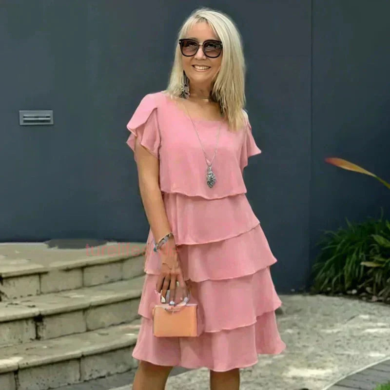 Abito da donna con taglio a onde e volant