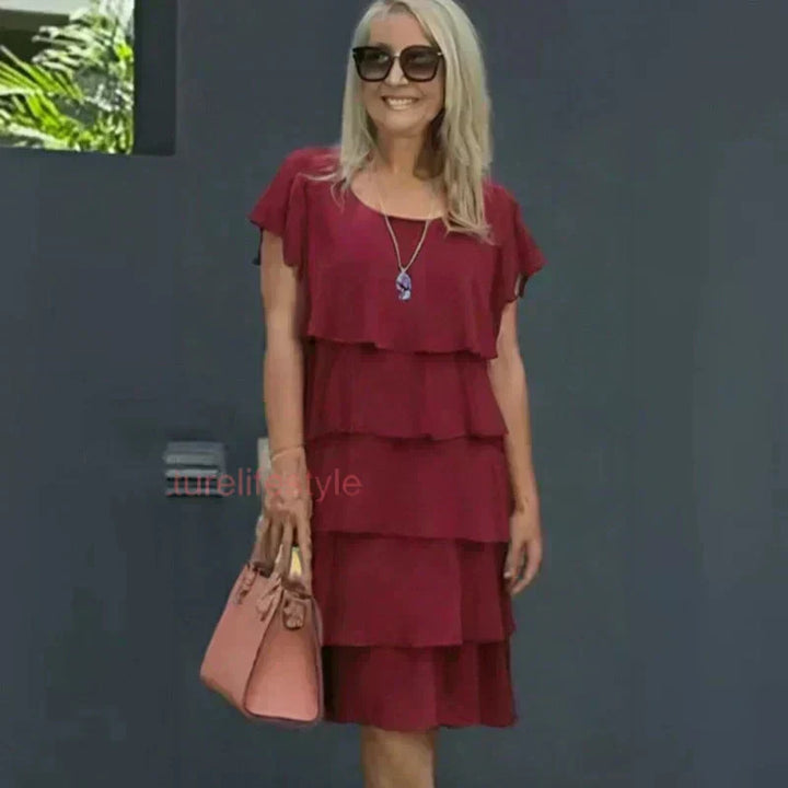 Abito da donna con taglio a onde e volant