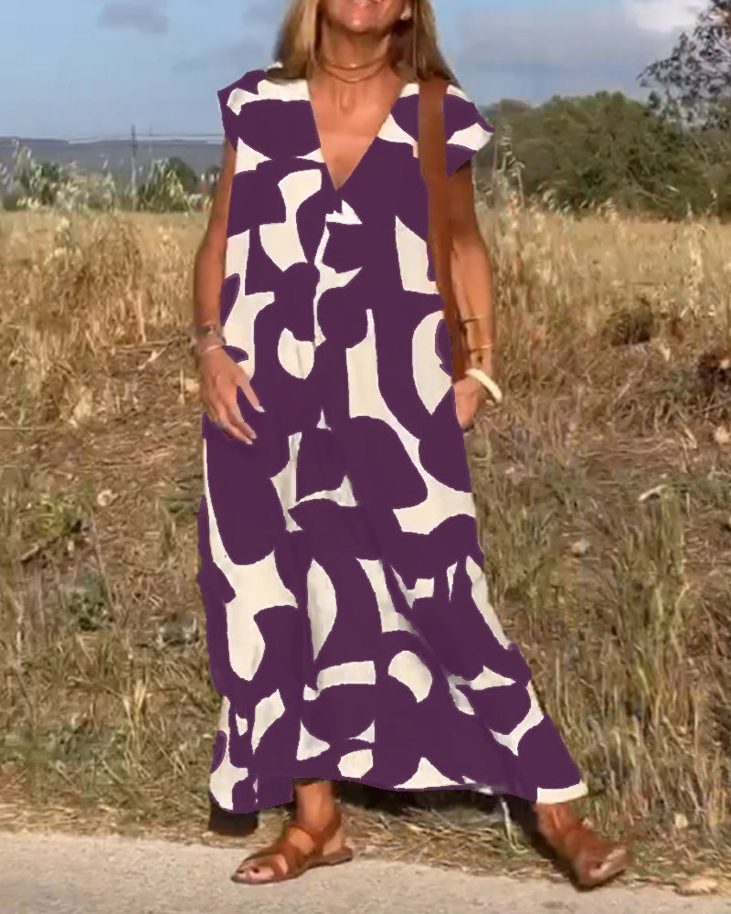NAOMI™ | Abito Lungo Stampato con Scollo a V e Linea Svasata per un Look Estivo