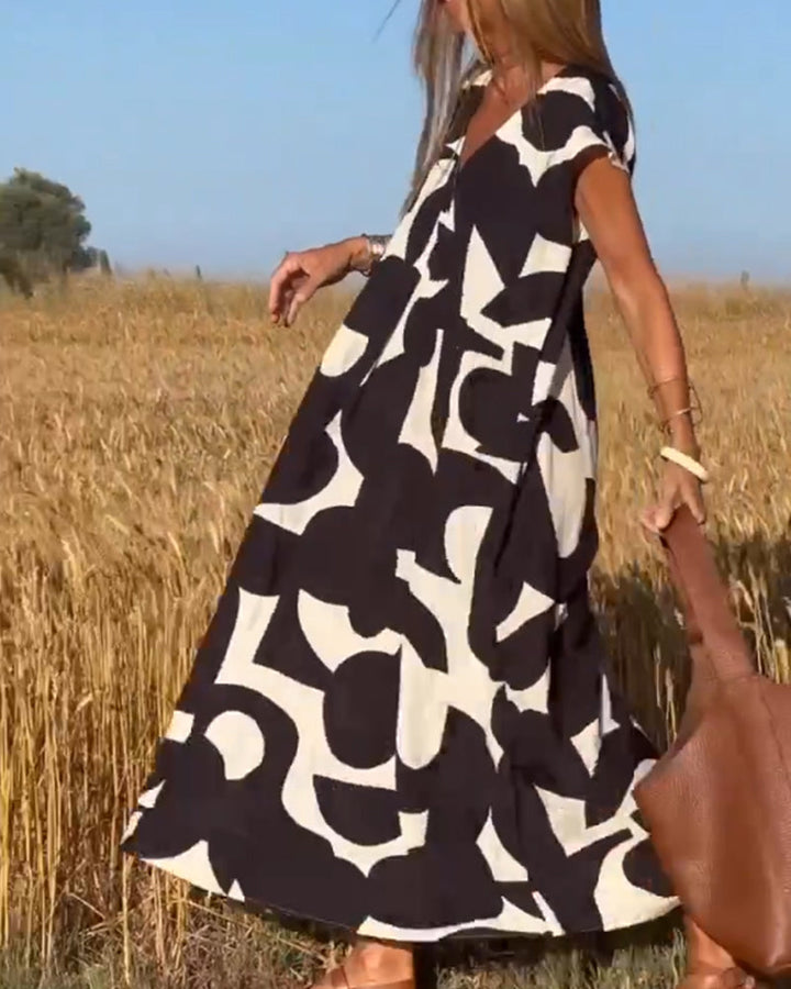 SITA™ | Vestito Elegante con Stampa e Scollatura a V