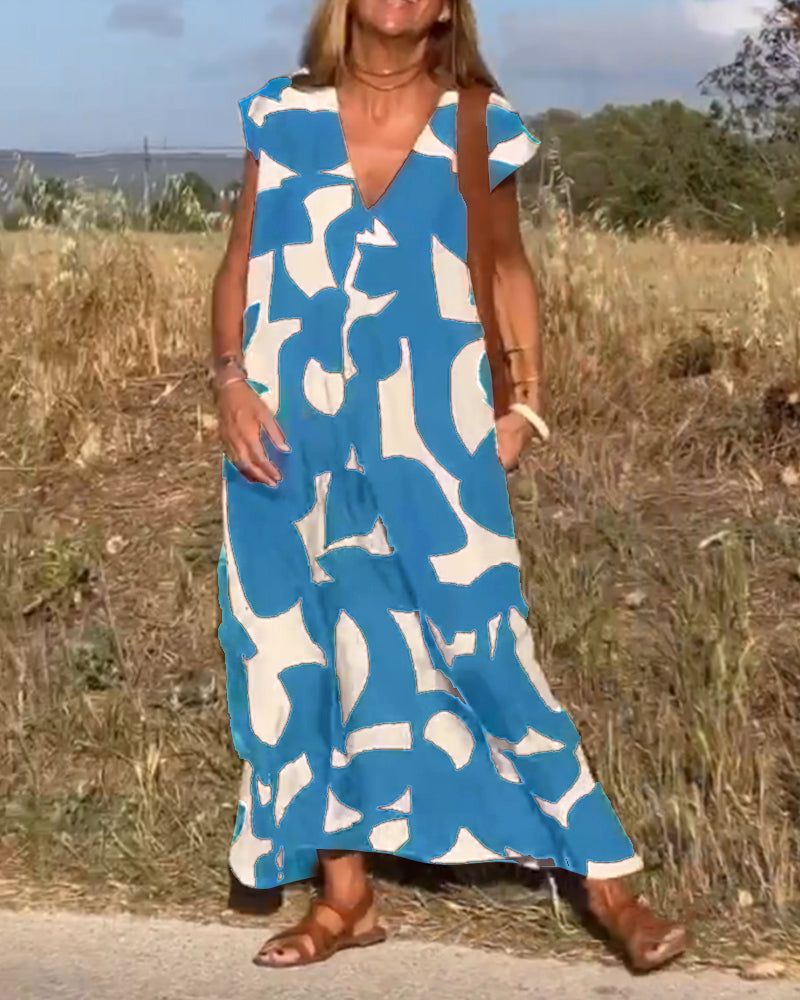 NAOMI™ | Abito Lungo Stampato con Scollo a V e Linea Svasata per un Look Estivo