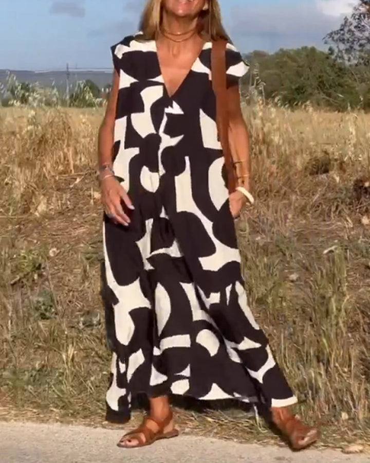 NAOMI™ | Abito Lungo Stampato con Scollo a V e Linea Svasata per un Look Estivo