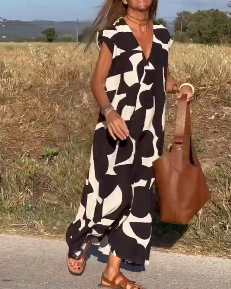 NAOMI™ | Abito Lungo Stampato con Scollo a V e Linea Svasata per un Look Estivo