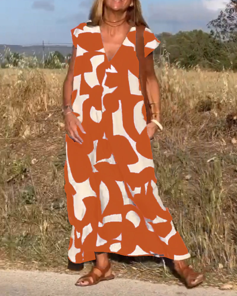 NAOMI™ | Abito Lungo Stampato con Scollo a V e Linea Svasata per un Look Estivo