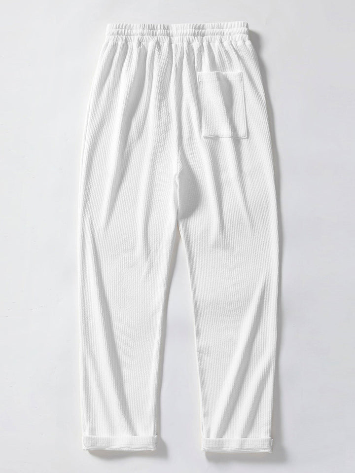 Polo Shirt in Maglia Jacquard a Strisce e Pantaloni a Gamba Dritta a Coste