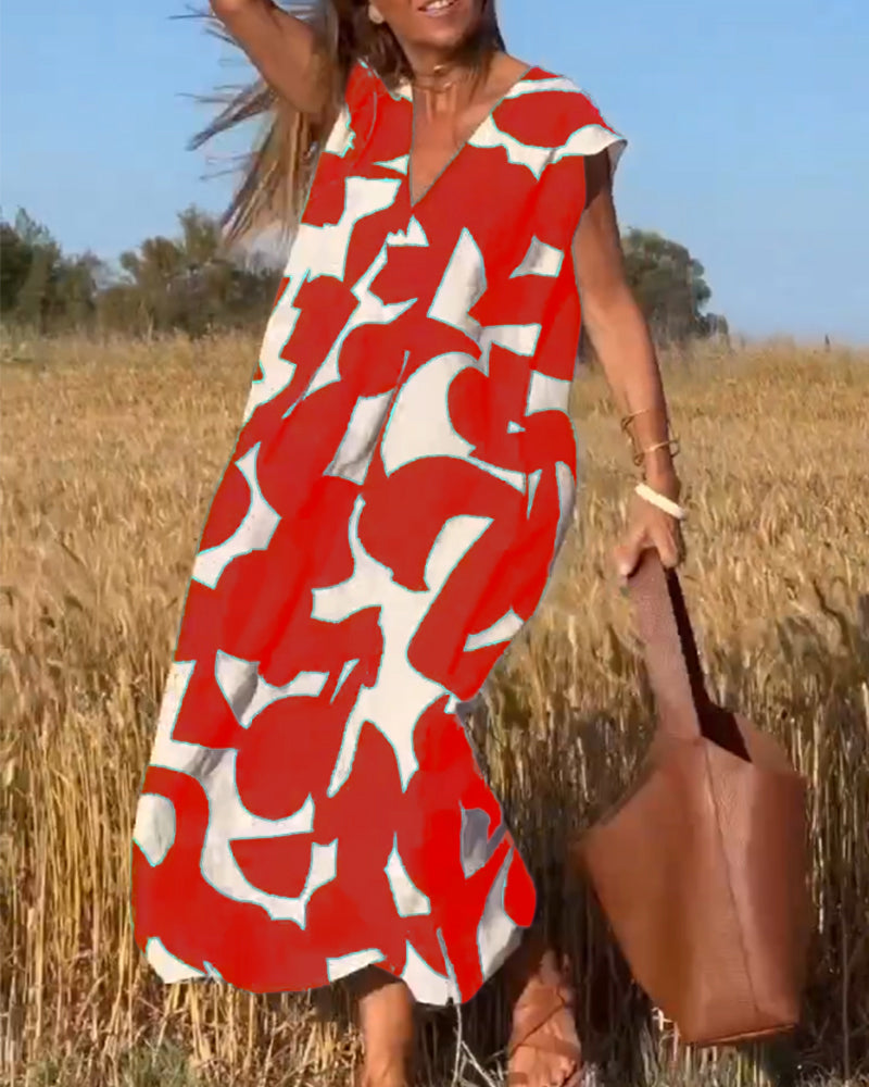 NAOMI™ | Abito Lungo Stampato con Scollo a V e Linea Svasata per un Look Estivo