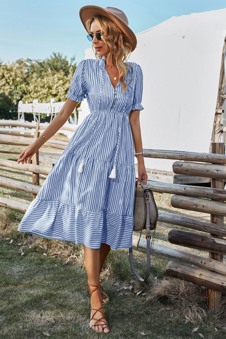 Lucia | Stile Frizzante con Abito Midi a Righe con Frange