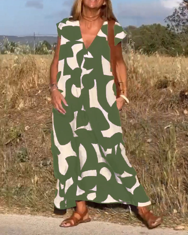 NAOMI™ | Abito Lungo Stampato con Scollo a V e Linea Svasata per un Look Estivo