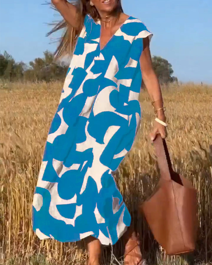 NAOMI™ | Abito Lungo Stampato con Scollo a V e Linea Svasata per un Look Estivo